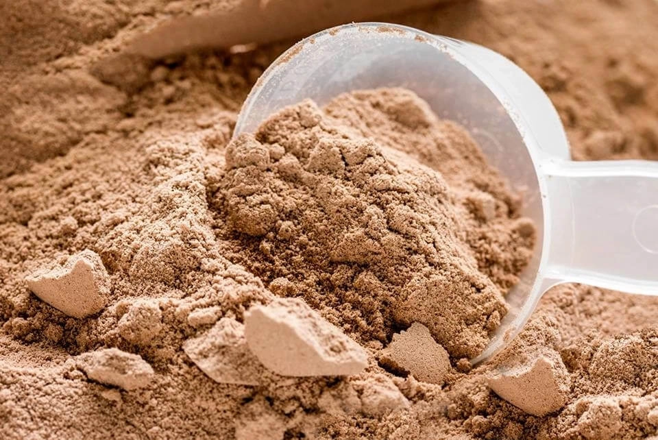 GROWTH SUPPLEMENTS - Imagem ilustrativa Scoop com Whey