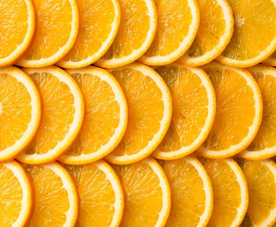 GROWTH SUPPLEMENTS - Imagem ilustrativa diversas fatias de laranja.