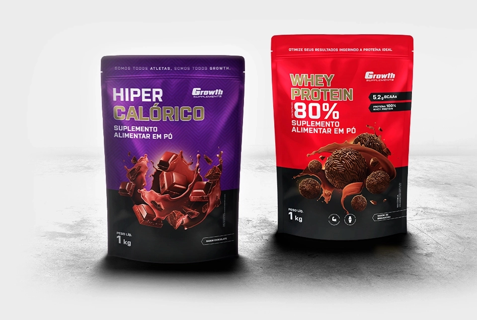 Dois potes de suplemento Growth Supplements sobre fundo cinzento
