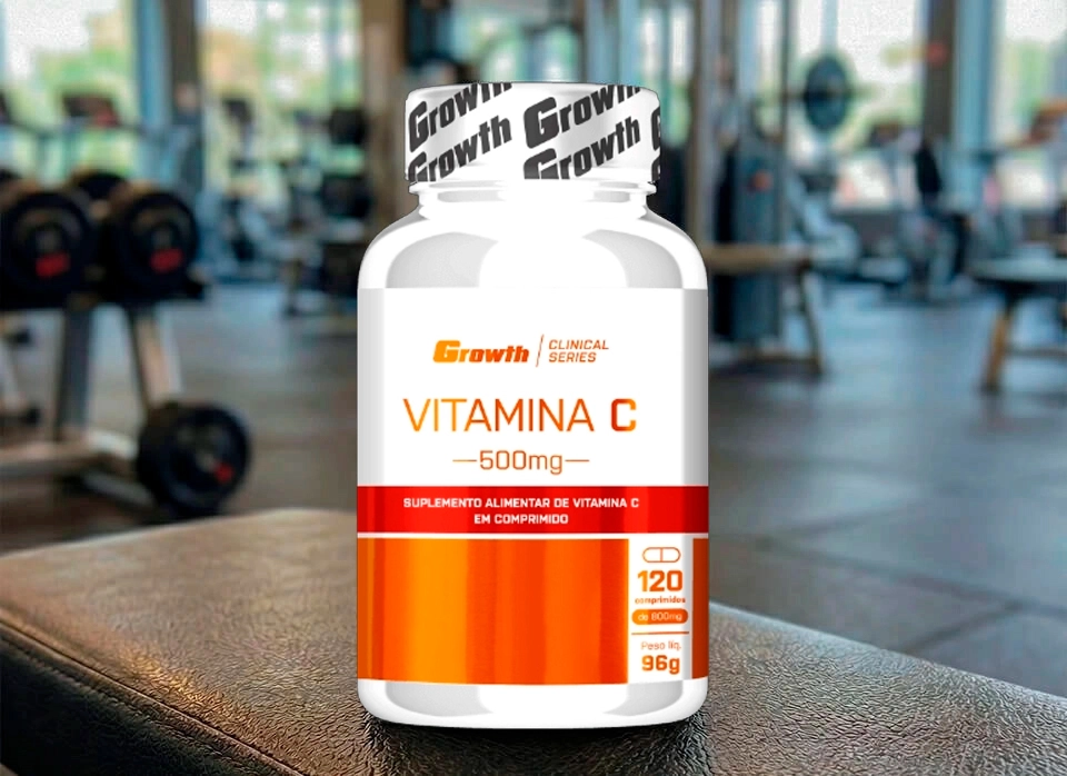 GROWTH SUPPLEMENTS - Vitamina C ao fundo uma academia