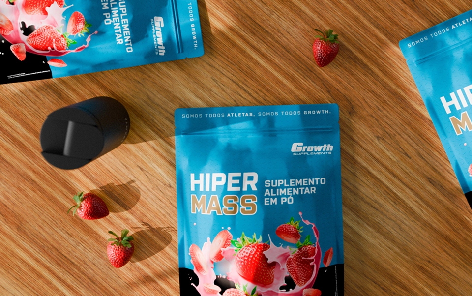 HIPER MASS SABOR MORANGO EM CIMA DA MESA - growth supplements