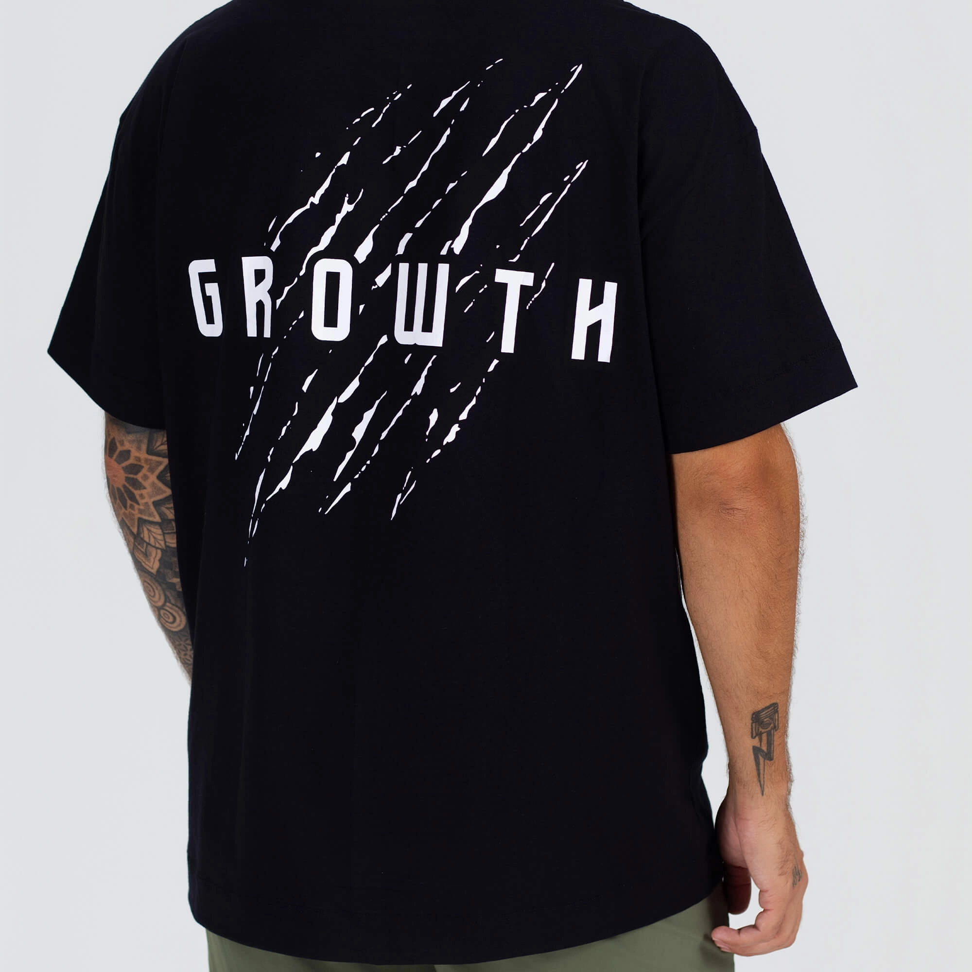 Camiseta Oversized Growth Under Garras 